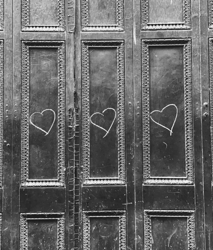 hearts drawn on city door